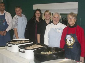 Members of the Interfaith Caring Kitchen are seen in this file photo.