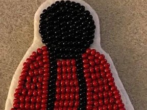 The Fort Saskatchewan Public Library is raising awareness for Missing and Murdered Indigenous Women and Girls by providing red dress pins, made by local artist Cree-ative Designs. Photo Supplied.