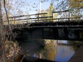 The closed pedestrian bridge at Oak Street, running over Chippewa Creek, will be replaced as part of a $763,000 project by the North Bay-Mattawa Conservation Authority. Michael Lee/The Nugget