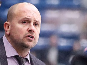 Sudbury Wolves head coach Cory Stillman watches the action from behind the bench during the 2019-20 OHL season.