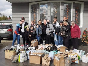 Sherwood Park's Klassen family, along with friends and community support, provided hundreds of packaged meals and warm necessities for Edmonton's homeless on Thanksgiving Sunday. Photo Supplied