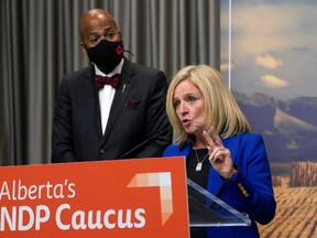 Alberta NDP leader Rachel Notley (right) and health critic David Shepherd (left) criticize the Alberta UCP government's plan to revise the province's public health care system on Tuesday Oct.13. LARRY WONG/POSTMEDIA