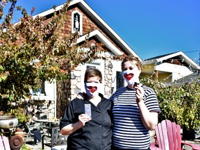 Soul House Sweets owner Kerri Bauer (left) and her daughter pose in front of the family home.
(Emily Jansen)