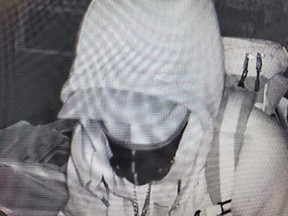 Police are looking to identify the person, pictured, who is believed to have entered a business in the 100 block of Progress Road, Oct. 10, and taken a small amount of cash. North Bay Police Service photo