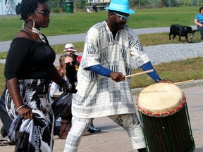 Justine Gogoua dances as her brother, Herve Mility, plays the drum at the launch of Nipissing Culture Days in September.
Nugget File Photo