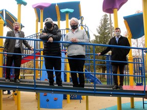 Ralph Celentano, left, and Liam Sangster, right, of the Kiwanis Club of Nipissing check out the Kiwanis Playworld with Joshua Selin and Coun. Johanne Brousseau, Thursday.
PJ Wilson/The Nugget
