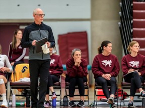 Sherwood Park's Ken Briggs coaching the MacEwan University Griffins women's volleyball team, which found out last week that their season had been canceled. Photo courtesy Robert Antoniuk