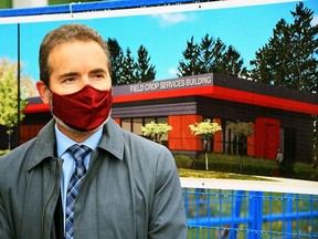 Rene Van Acker, dean of the Ontario Agricultural College of the University of Guelph, answers a media question about a new $6.5-million field crop services building on Monday. Shown behind Van Acker is a rendering of the new building, expected to be complete in 2022. (Tom Morrison/Postmedia)