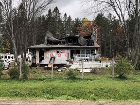 A home on Main Street in Powassan, seen Sunday afternoon, following an overnight fire. Michael Lee/The Nugget