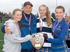 Ray Lewis, the recipient of the Field Hockey Canada 2020 Grassroots Coaching Award, said one of his proudest moments in his coaching career was when all three of his daughters made it to OFSAA in the same year. From left are Bryn Lewis, Ray Lewis, Neeliah Lewis and Kyra Lewis. Handout