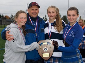 Ray Lewis, the recipient of the Field Hockey Canada 2020 Grassroots Coaching Award, said one of his proudest moments in his coaching career was when all three of his daughters made it to OFSAA in the same year. From left are Bryn Lewis, Ray Lewis, Neeliah Lewis and Kyra Lewis. Handout