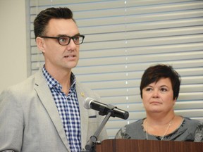 City of Grande Prairie Mayor Bill Given (left) speaks while County of Grande Prairie Reeve Leanne Beaupre watches on during the celebration of the County Connector's launch at the Wellington Resource Centre in Clairmont, Alta. on Dec. 10, 2018.
