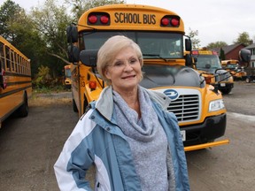 Susan Cain, a school bus driver for four years, stands next to her bus at Wight Bus Lines in Point Edward. Wednesday is national School Bus Driver Appreciation Day.