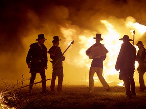 An image from the three-hour film documenting the War of 1812, including scenes shot in Chatham-Kent, show American forces burning settlements after The Battle of the Thames on Oct. 5, 1813. File photo/Postmedia Network