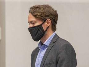 Dr. Chris Mackie, the medical officer of health for London-Middlesex, is seen addressing London city council in this July file photo. Derek Ruttan/Postmedia Network