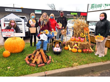 The winners of the 2020 Petawawa Ramble Pumpkin Folks residential decorating contest were presented with their prizes Oct. 15 to officially kick off the Petawawa Ramble, which continues throughout the weekend. On hand for the presentations (from left) sponsor and judge Cindy Sell from Re/Max, Cathy Warren, who placed third in the best harvest display with a theme category; Rachel Eden and baby Evie, who placed second in the most unique harvest display category; Heather and Dave Jobe, who were first in the most unique harvest display category and Natalie Keenan, who received an honourable mention judges choice award.