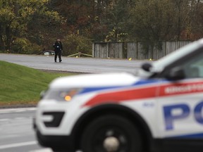 Kingston Police investigate a fatal collision that killed one person and injured multiple others on Bayridge Drive in Kingston on Wednesday night. (Elliot Ferguson/The Whig-Standard)