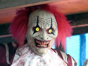 An evil clown sits at the ready to scare visitors to the Spruce Ridge Scare haunted house in Spruce Grove. The attraction is overseen by one family and is marking its fourth year this year.