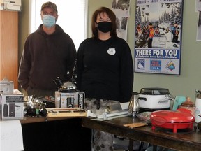 Chris and Lee Ann McMillan, of Bruce Mines Sno Glyders Snowmobile Club, run what they billed as a “safe” charity garage sale, which was poorly attended, but produced ’steady’ online sales. Dan Kerr