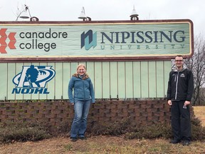 J.J. Johnson, right, Powassan Voodoos head trainer and equipment manager and master of science in kinesiology student, stands with Dr. Kristina Karvinen outside Nipissing University in North Bay.