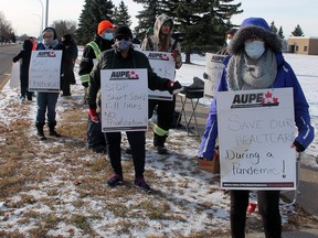 Standing up for Alberta’s health

Frontline workers at the Wetaskiwin Hospital and Care Centre walked off the job Monday, joining thousands of other AUPE members in protesting Alberta Health Minister Tyler Shandro’s plan to cut 11,000 from the health care sector at the end of the COVIDC-19 pandemic.