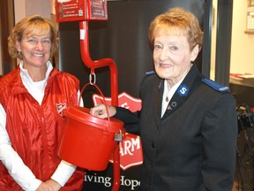 Sarnia-Lambton Kettle co-ordinator Brenda Dunn and long-time Salvation Army volunteer Margo Brett prepare for this the 2019 Christmas Kettle Campaign in this file photo. The 2020 Christmas Kettle Campaign begins Nov. 13 with enhanced safety features due to COVID-19. File photo/Sarnia This Week