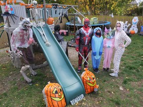 The Harvey Family in Tillsonburg decorated its backyard for Halloween this year for a small private party for their children and a few friends. From left are Peter, Kaylie, Sierra and Terri Harvey. (Chris Abbott/Norfolk and Tillsonburg News)