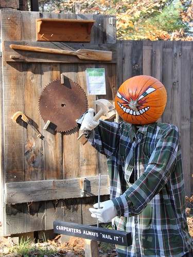 A Petawawa Pumpkin folk person with carpentry skills gets the job done in this display at the Petawawa Heritage Village. Anthony Dixon