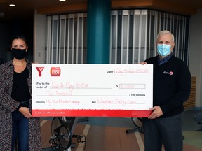 Nicole Beattie, left, of the YMCA of Northeastern Ontario, accepts a cheque for $5,000 from Tom Welton, director of prevention services and education programs at Workplace Safety North as part of the My Y is Resilient fundraising campaign.
Submitted Photo