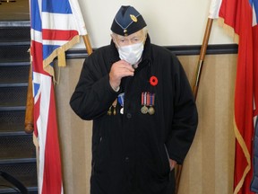 Charlie Whiteland, a 98-year-old Brockville veteran, displays the poppy pinned on by his son Barry at city hall. Wayne Lowrie/Recorder and Times