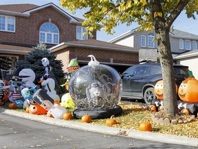 The front yard of a house on Wise Street in Kingston is completely filled with the Halloween spirit on Friday. (Julia McKay/The Whig-Standard)