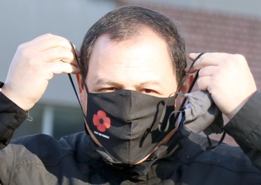 Mayor Christian Provenzano prepares to attend launch of Royal Canadian Legion Branch 25 poppy campaign at cenotaph on Queen Street East in Sault Ste. Marie, Ont., on Friday, Oct. 30, 2020. (BRIAN KELLY/THE SAULT STAR/POSTMEDIA NETWORK)