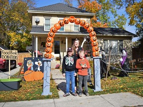 The Caldwell family decorated their Richmond Street South home in Hensall to keep the spooky spirit alive, all while gathering donations for the Huron County Food Bank Distribution Centre. Pictured are Mason, Haylee and Bentley Caldwell at their Hensall home. Missing is Eric Caldwell. Dan Rolph