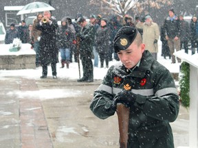 Army cadet Isaac Baldwin, master corporal with the 2563 1st Hussars Petrolia Army Cadet corps, stands at attention as the bugler plays The Last Post during 2019 Remembrance Day ceremonies at the Corunna cenotaph. Remembrance Day ceremonies across Lambton County have either been scaled back or cancelled in 2020 due to COVID-19. Carl Hnatyshyn/Sarnia This Week