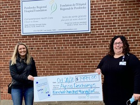 Pembroke Regional Hospital Foundation Catch the Ace progressive jackpot raffle – week number 14 winner Alyssa Deschamps, left, is presented with her cheque for the weekly pot amount of $1,994 from Leigh Costello, the Foundation's community fundraising specialist. Submitted photo