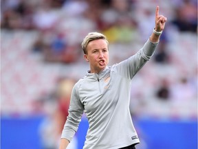 Bev Priestman, assistant coach of England conducts the warm up prior to the 2019 FIFA Women's World Cup France group D match between Japan and England at Stade de Nice in Nice, France on June 19, 2019.
