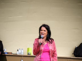 Georgina Lightning speaks at 9th inaugural Hate to Hope Rally in Edmonton with Indigenous Minister Rick Wilson. (Photo By Darlene Darlene Hildebrandt)