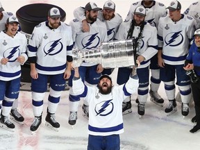 Zach Bogosian of the Tampa Bay Lightning skates with the Stanley Cup following the series-winning victory over the Dallas Stars in Game Six of the 2020 NHL Stanley Cup Final at Rogers Place on September 28, 2020 in Edmonton, Alberta, Canada.