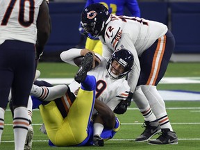 Bears quarterback Nick Foles is sacked by linebacker Terrell Lewis of the Los Angeles Rams on Monday.