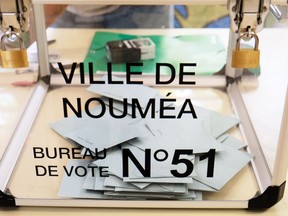 This picture shows a ballot box at a polling station in the referendum on independence on the French South Pacific territory of New Caledonia in Noumea on October 4, 2020. - The French South Pacific territory of New Caledonia votes in an independence referendum on October 4, 2020, which is expected to reject breaking away from France after almost 170 years despite rising support for the move. (Photo by Theo Rouby / AFP)