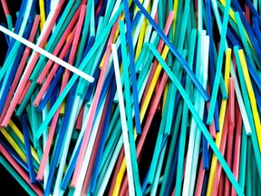 (FILES) this file photo taken on August 12, 2018 shows plastic straws, in a studio, in Paris. - Checkout bags, straws and four other single-use plastic items will be banned in Canada by the end of 2021, the environment minister announced Wednesday, while acknowledging the nation is trailing Europe in recycling efforts. (Photo by Olivier MORIN / AFP) (Photo by OLIVIER MORIN/AFP via Getty Images)