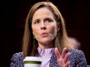 Judge Amy Coney Barrett responds to a question from Democratic vice presidential candidate Senator Kamala Harris (D-CA) during the third day of her Senate confirmation hearing to the Supreme Court on Capitol Hill in Washington, D.C., Oct. 14, 2020.