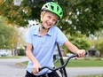 Ten-year-old AJ Hopman of Chatham, Ont., raised money for the Canadian Cancer Society by riding his bike nearly 10 kilometres in Chatham, Ont., on Saturday, Oct. 17, 2020. Mark Malone/Chatham Daily News/Postmedia Network