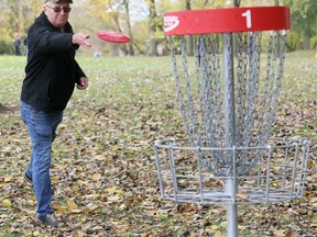 Thames Grove Disc Golf founder John Shewburg practises at the Thames Grove Disc Golf Course at the Thames Grove Conservation Area in Chatham, Ont., on Saturday, Oct. 24, 2020. Mark Malone/Chatham Daily News/Postmedia Network