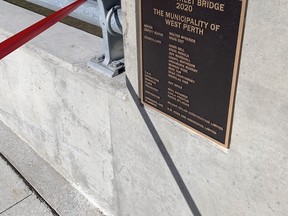 A ceremonial plaque listing West Perth council members and staff was part of the Henry Street bridge construction, unveiled officially during a brief COVID-19 shortened ceremony Oct. 13. ANDY BADER/MITCHELL ADVOCATE