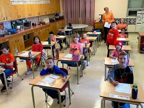 Grade 1/2/3 Class with Mrs. Ross (sub teacher) at Worsley Central celebrates Orange Shirt Day.