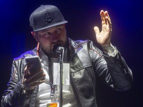 London country music veteran Aaron Allen accepts the rising star award at the CMAOntario Awards at Western Fair District'sThe Raceway in London on Sunday, Oct. 4. (Mike Hensen/The London Free Press)