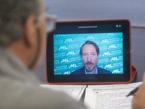 Tom Partalas, president and CEO of the BMO Centre, listens to Chris Mackie, medical officer of health with the Middlesex-London Health Unit, on Friday, Oct.23, 2020, as Mackie explains new health restrictions during a video conference. Partalas said the sticking point for his business is the ban on contact, "even though soccer only has incidental contact lasting less than a second," said Partalas. (Mike Hensen/The London Free Press)