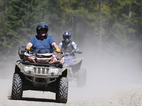 Off-roaders hit the trails on their ATVs in this Postmedia file photo.
