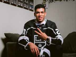 Quinton Byfield poses for a photo after the Los Angeles Kings made him their first-round pick, second overall, in the 2020 NHL Entry Draft on Tuesday night.